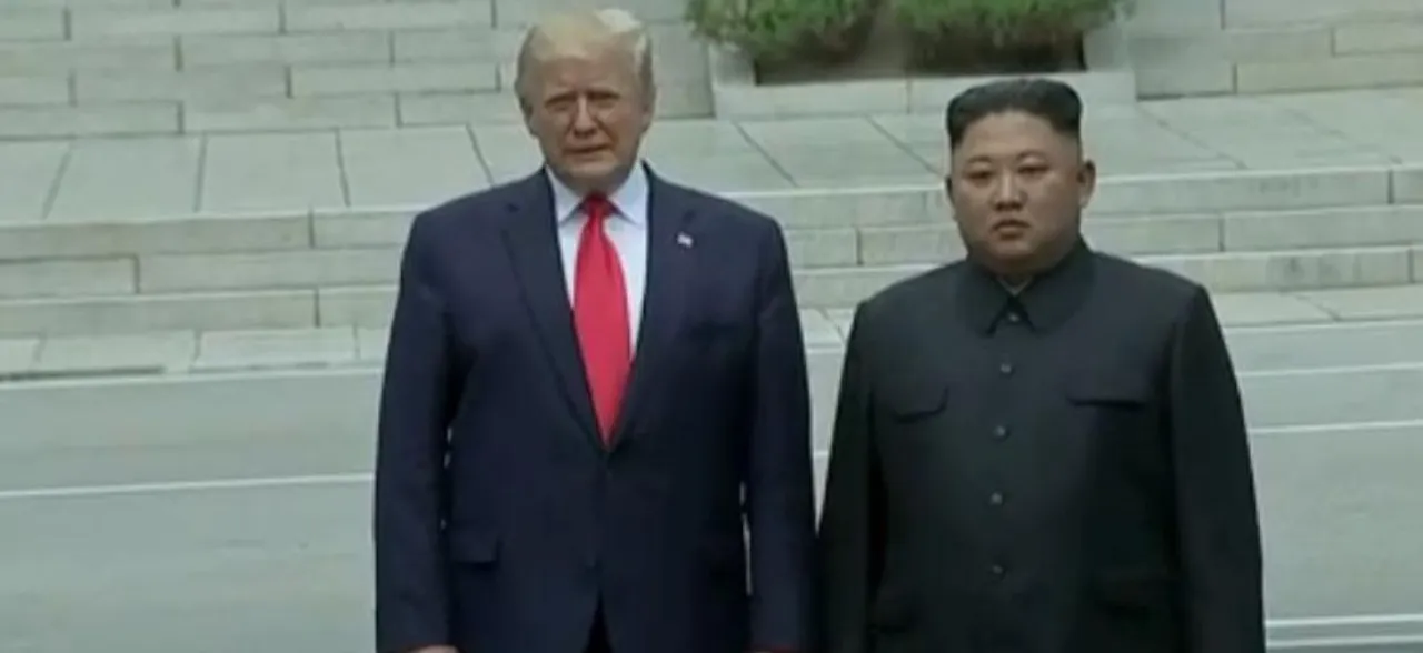 Trump meets Kim Jong Un in DMZ, becomes first sitting US president to step on North Korean soil