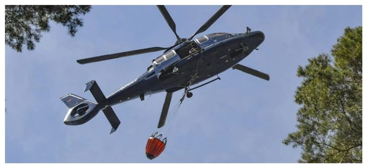 Catholic bishop to spray 'holy water' from helicopter to EXORCISE a city