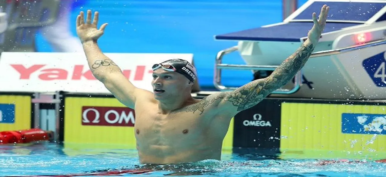 Caeleb Dressel overcomes poor start, win hat-trick of swimming world titles
