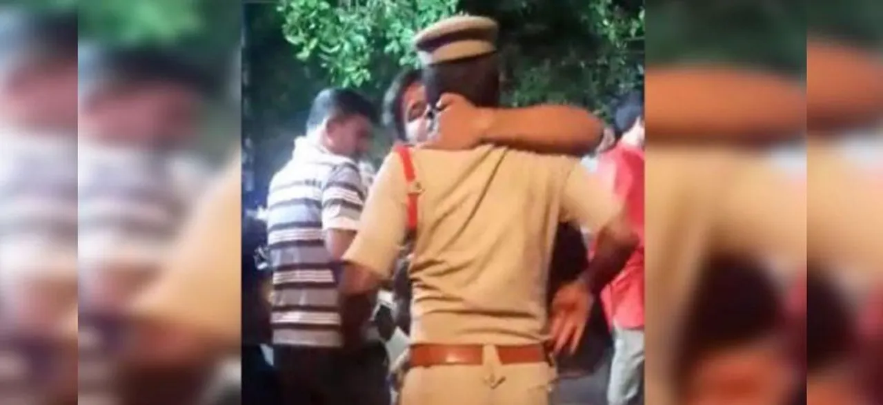 Man taken into custody for 'kissing' cop, video goes viral