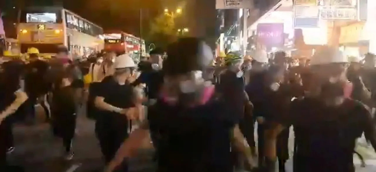 Hong Kong Protests: Pro-democracy protesters defy police orders with 'hit-and-run' rallies