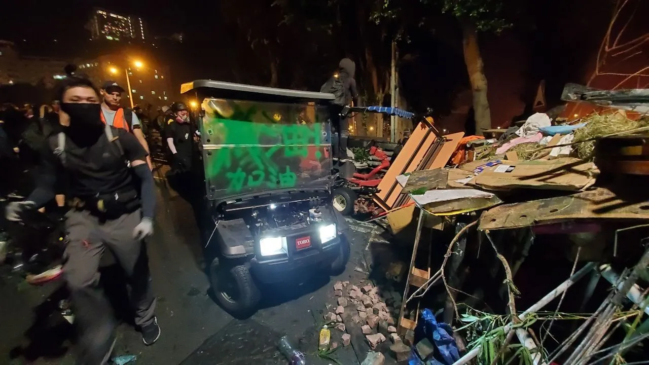 Hong Kong Clashes Rage On University Campus And Business District