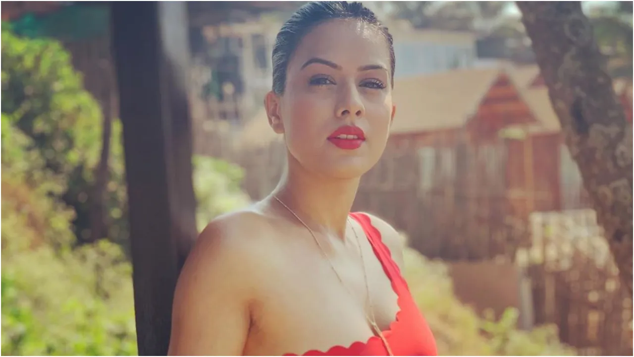 Nia Sharma Looks Super Sexy In Red Bikini And We Are Sweating!