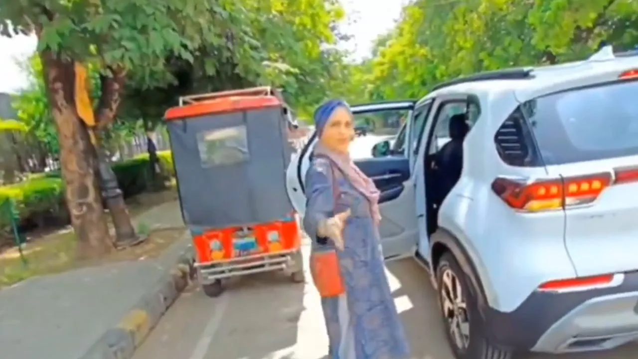 Woman objects Hindu sticker on bike