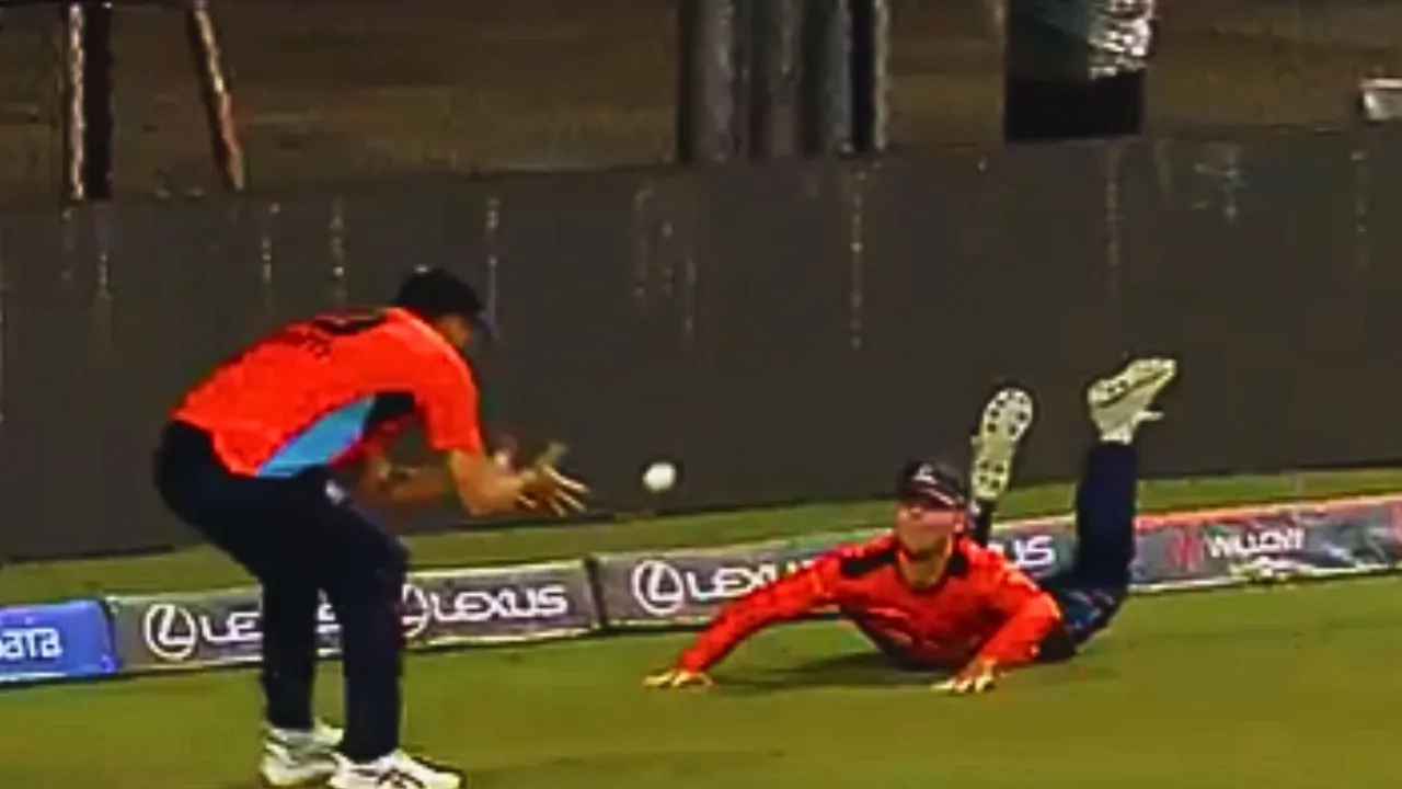 two players showed amazing agility on the boundary to save four video goes viral