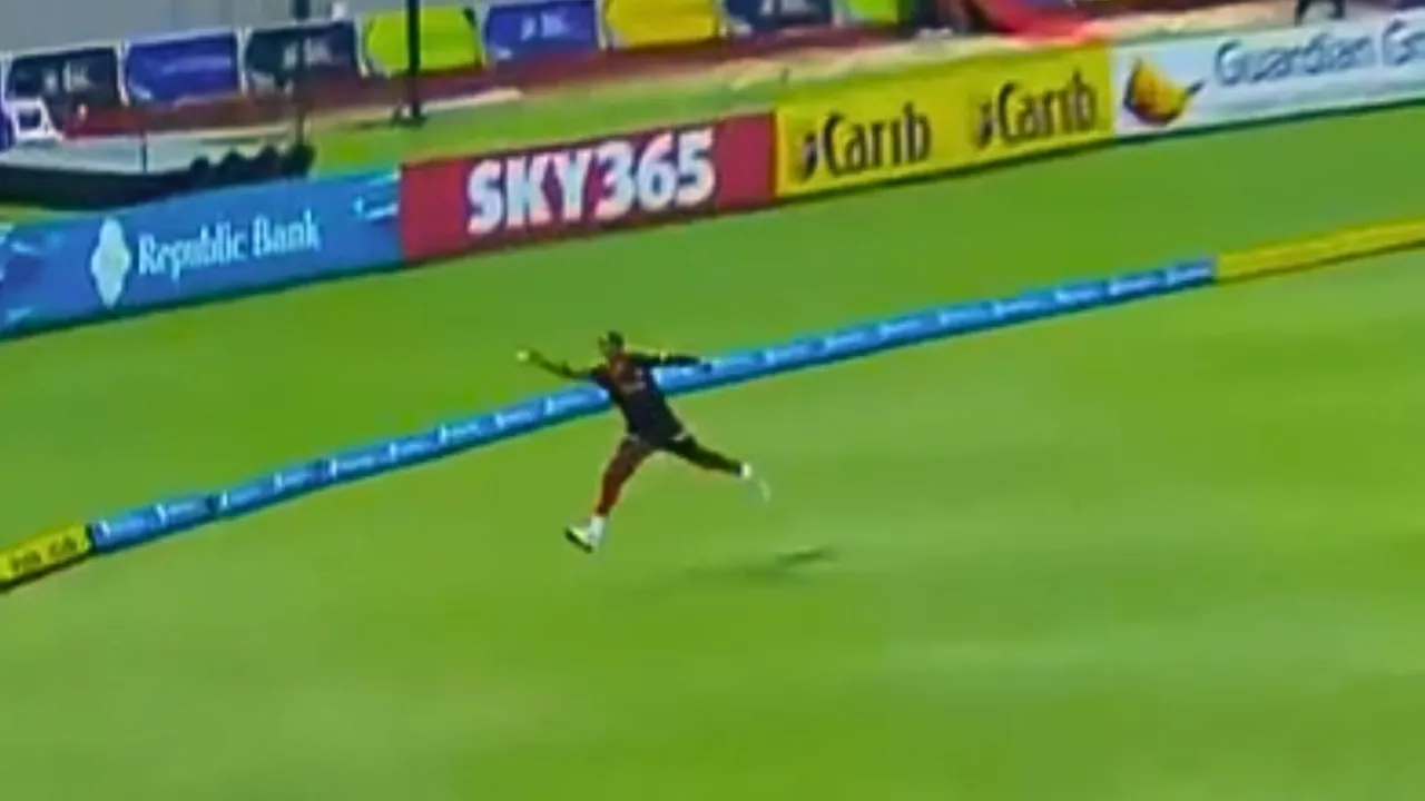 McKenny Clarke takes an one handed blinder in the caribbean premier league