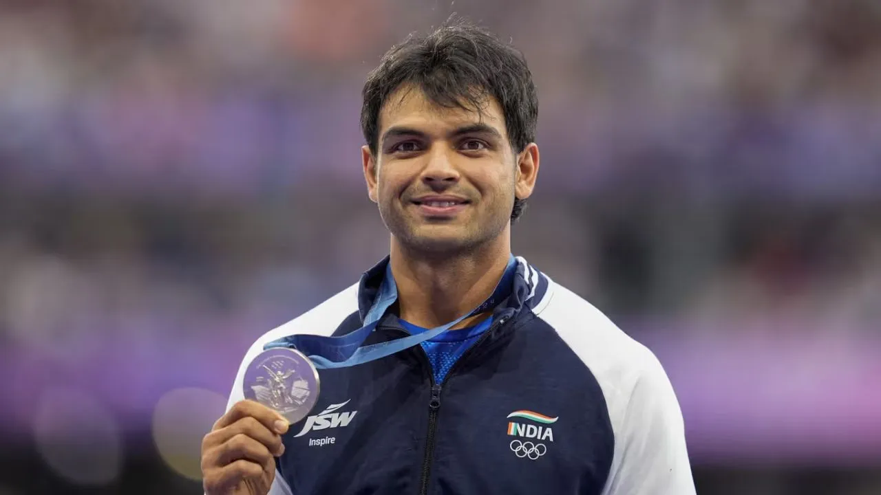 Neeraj Chopra reaches home first time after Olympics receive grand welcome watch video  