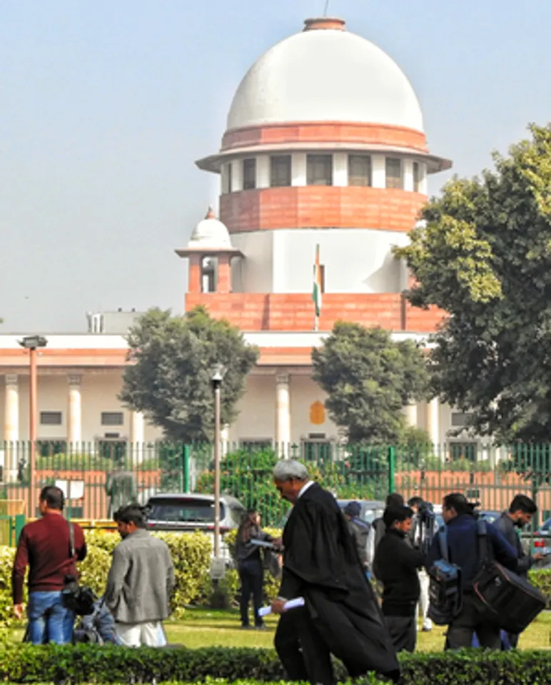New Delhi: Media persons at the Supreme Court complex on the day of the court's verdict