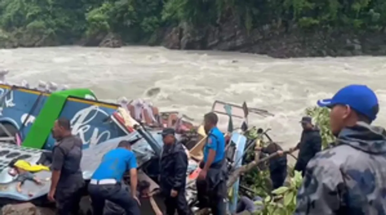Tanahun: Rescuers work at the crash site on the bank of the Marsyangdi River in Tanahun district