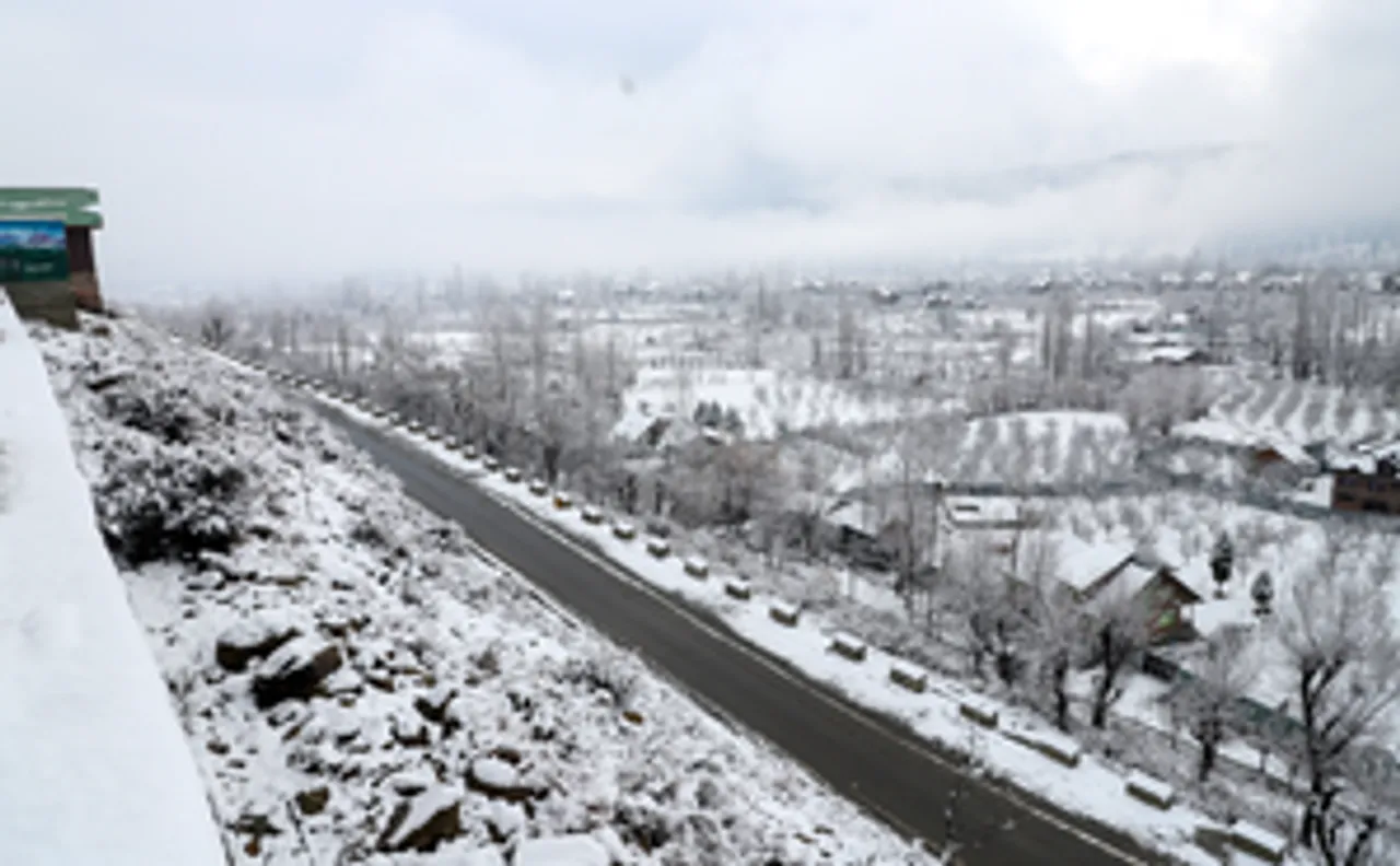 Baramulla: A top view of houses covered in a blanket of snow during the season's first snowfall