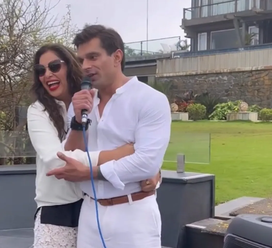 Bipasha Basu hugs hubby Karan as he channels his inner Elvis Presley