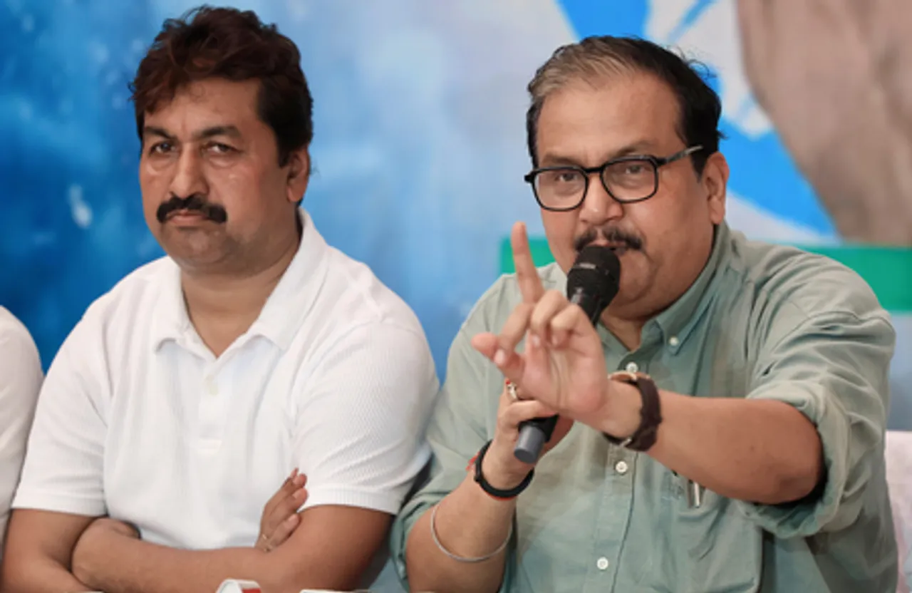 Patna: Randeep Singh Surjewala & Manoj Jha address a press conference
