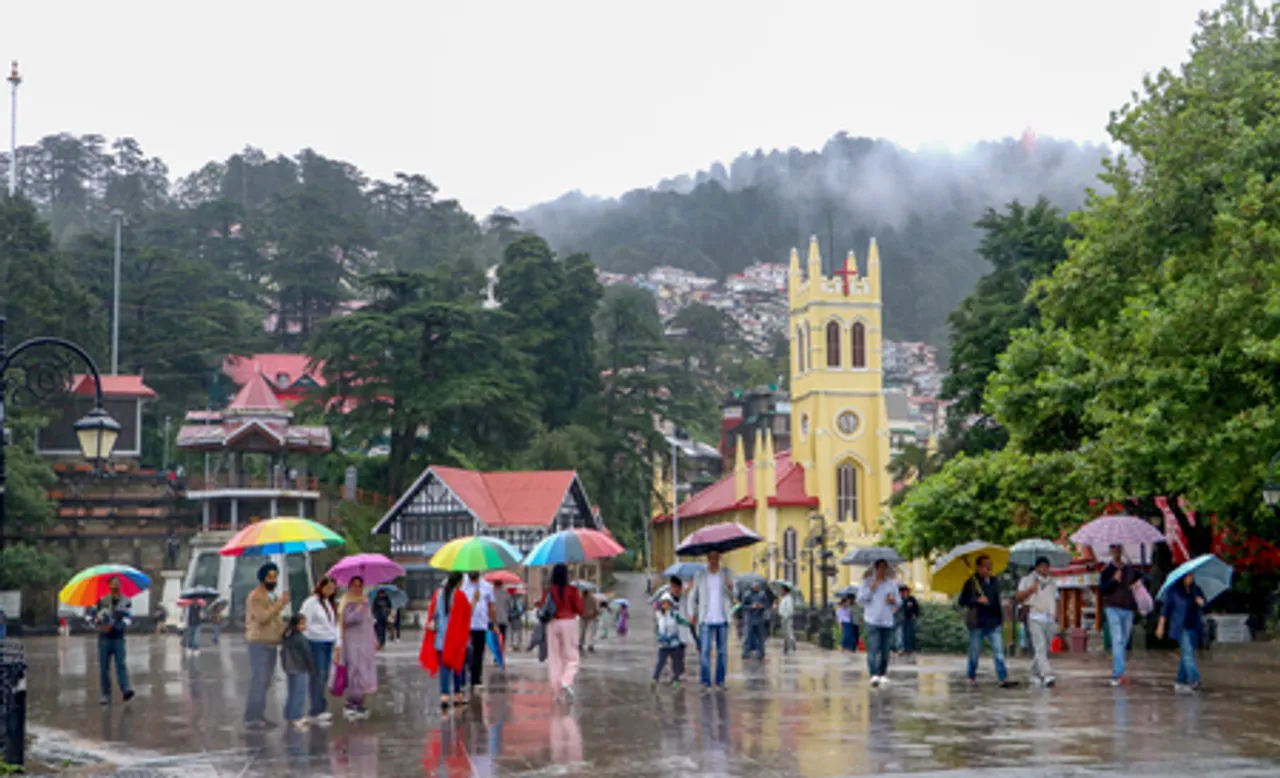 Tourists enjoy rains in Shimla