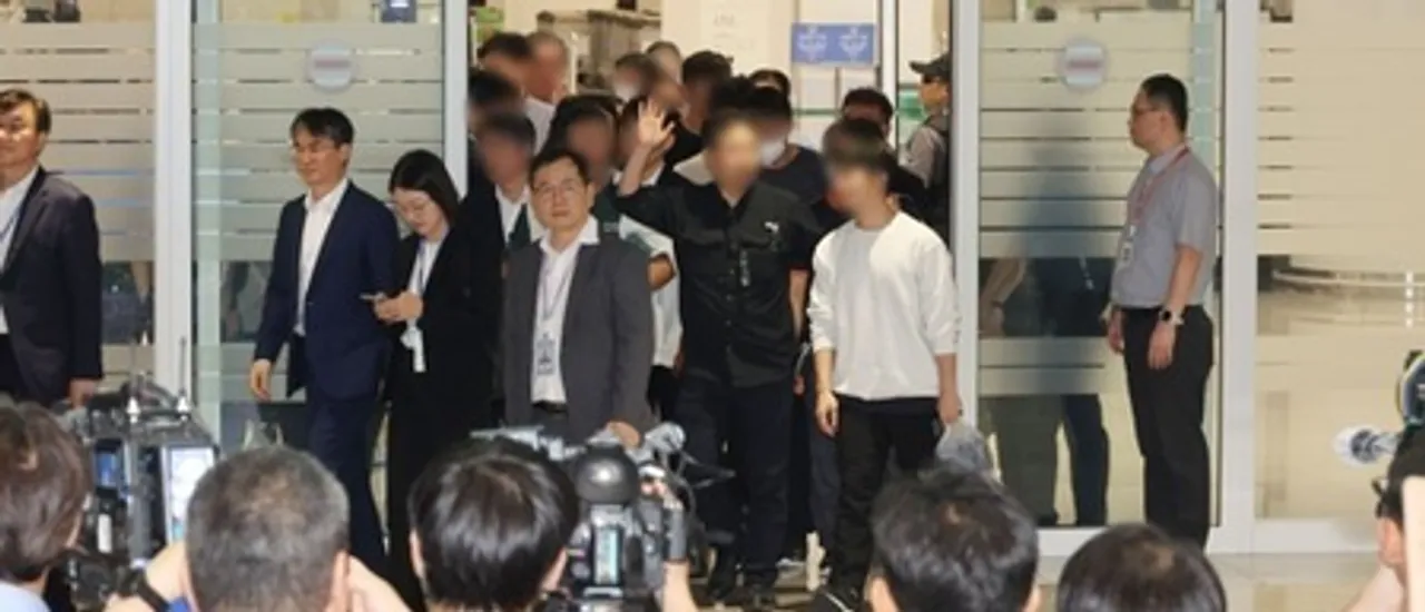 Korean workers rejoice as they return home after detention in US immigration raid