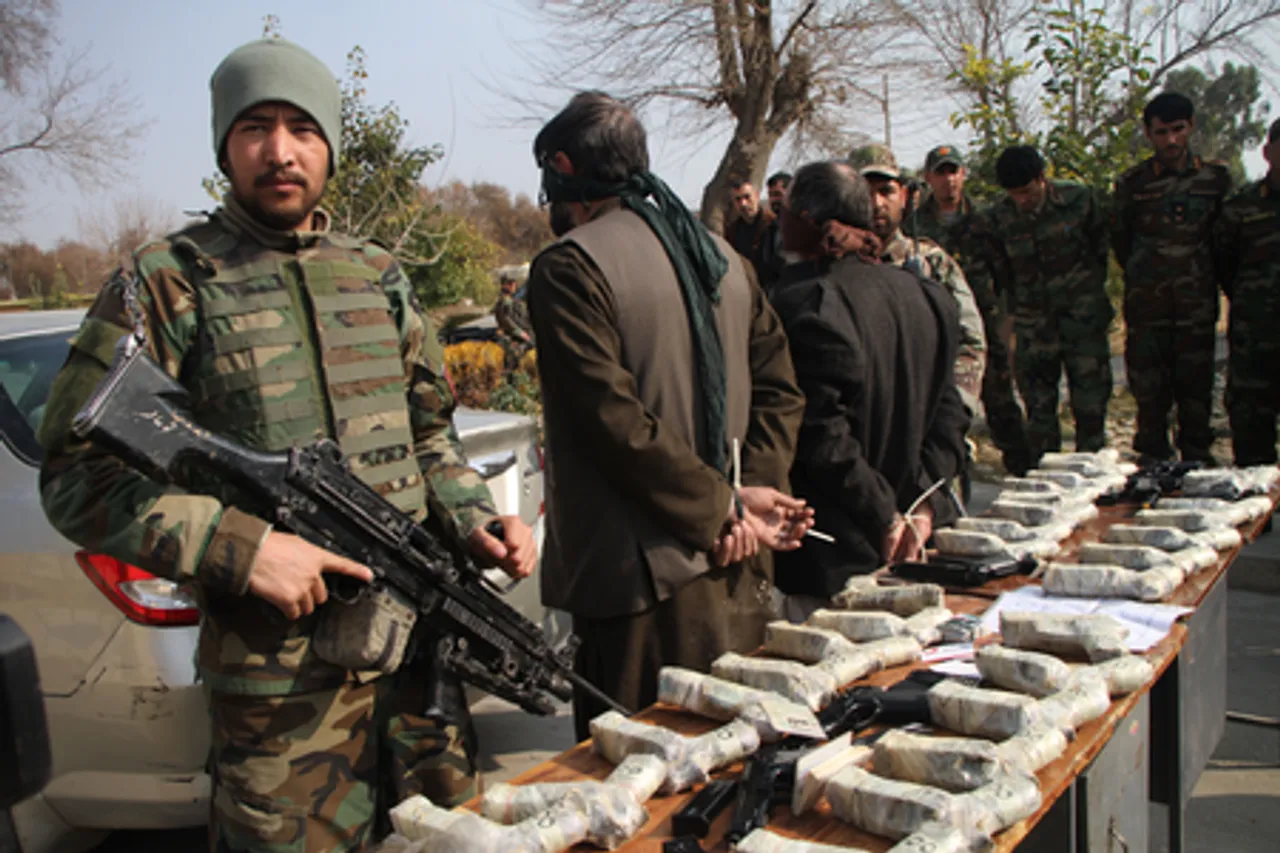 Afghan police confiscate weapons, ammunition cache, arrest suspects