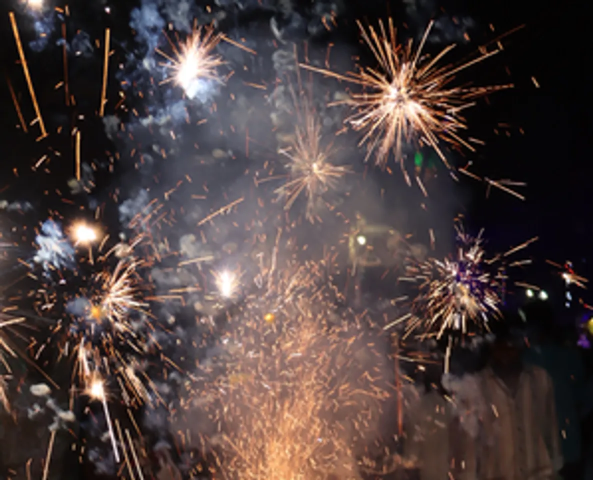 New Delhi : People light firecrackers to celebrate Diwali