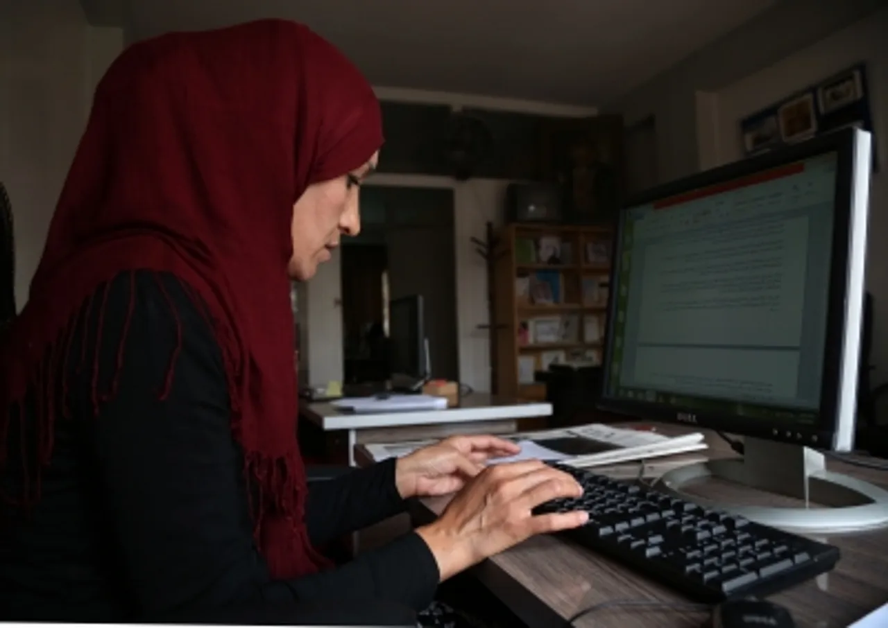 AFGHANISTAN-KABUL-FEMALE JOURNALIST-NEWSPAPER