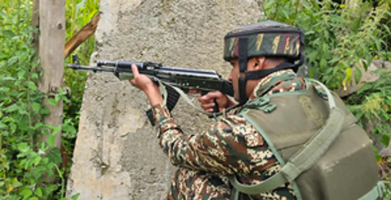Anantnag: Army personnel take their positions at the site of an encounter