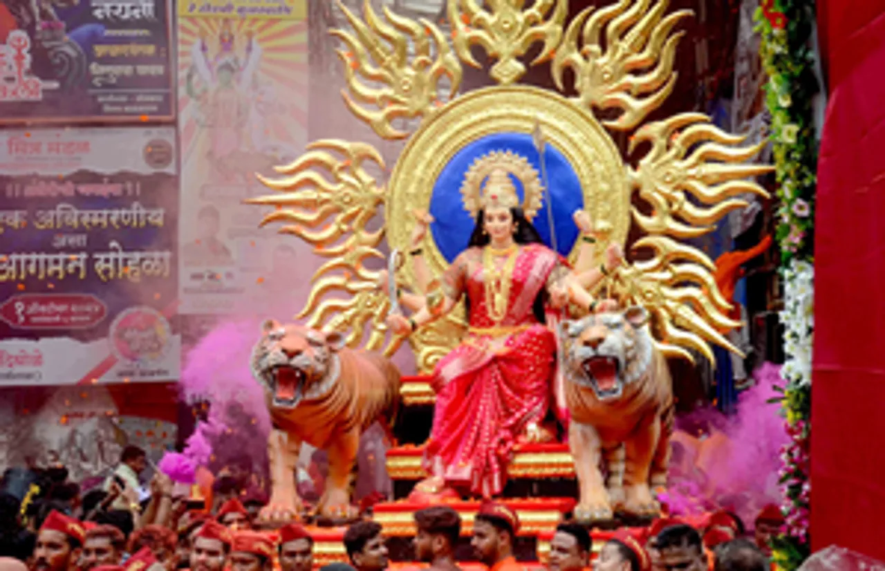 Mumbai: Devotees carry idols of Goddess Durga for Navratri festival