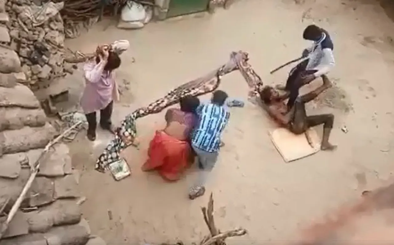 कानपुर में मारपीट का Video वायरल, बचाने आई महिला को भी पीटा