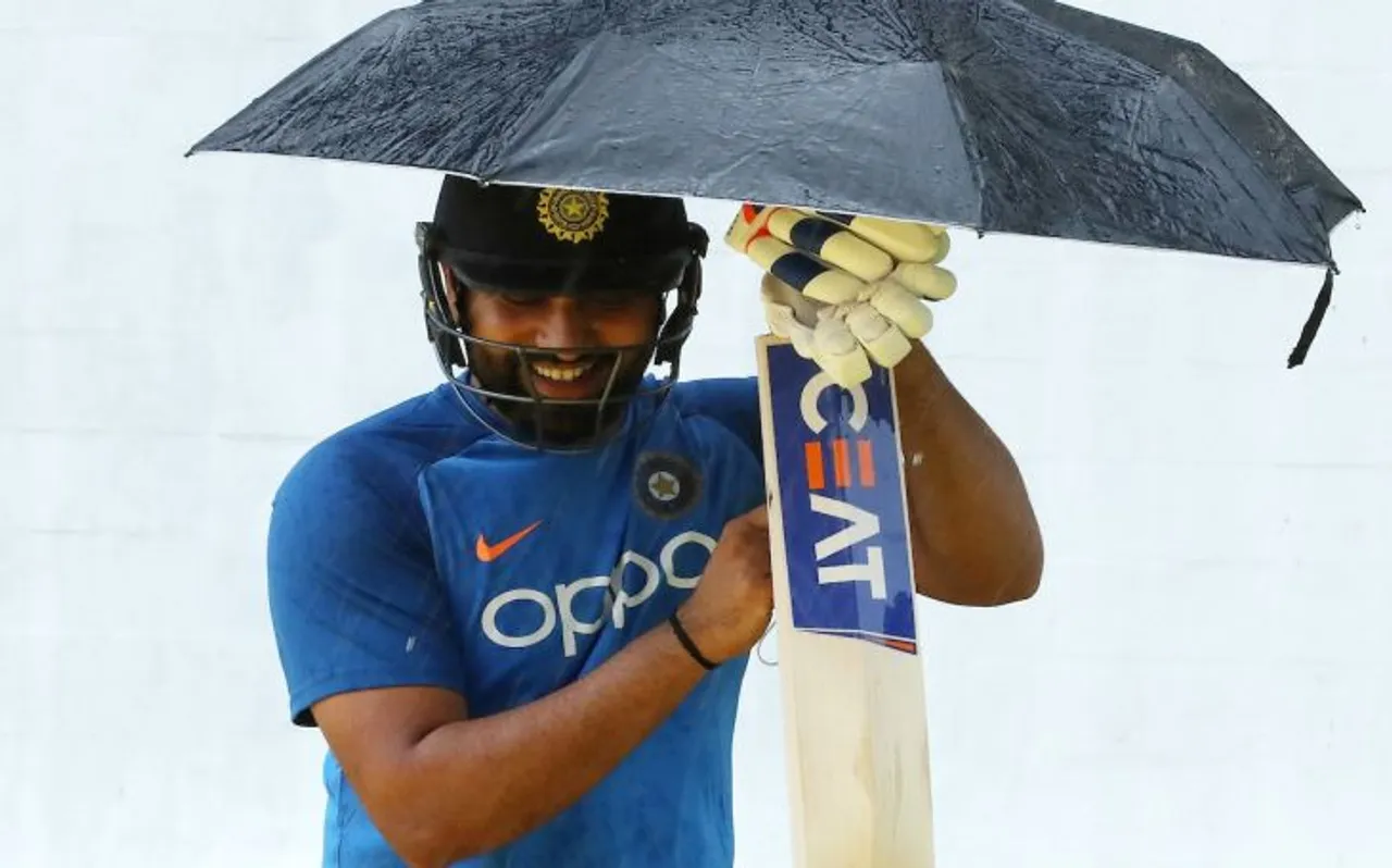 IND VS WI : रोहित के एक हाथ में बैट और दूसरे में छाता, जानें क्‍या है मामला