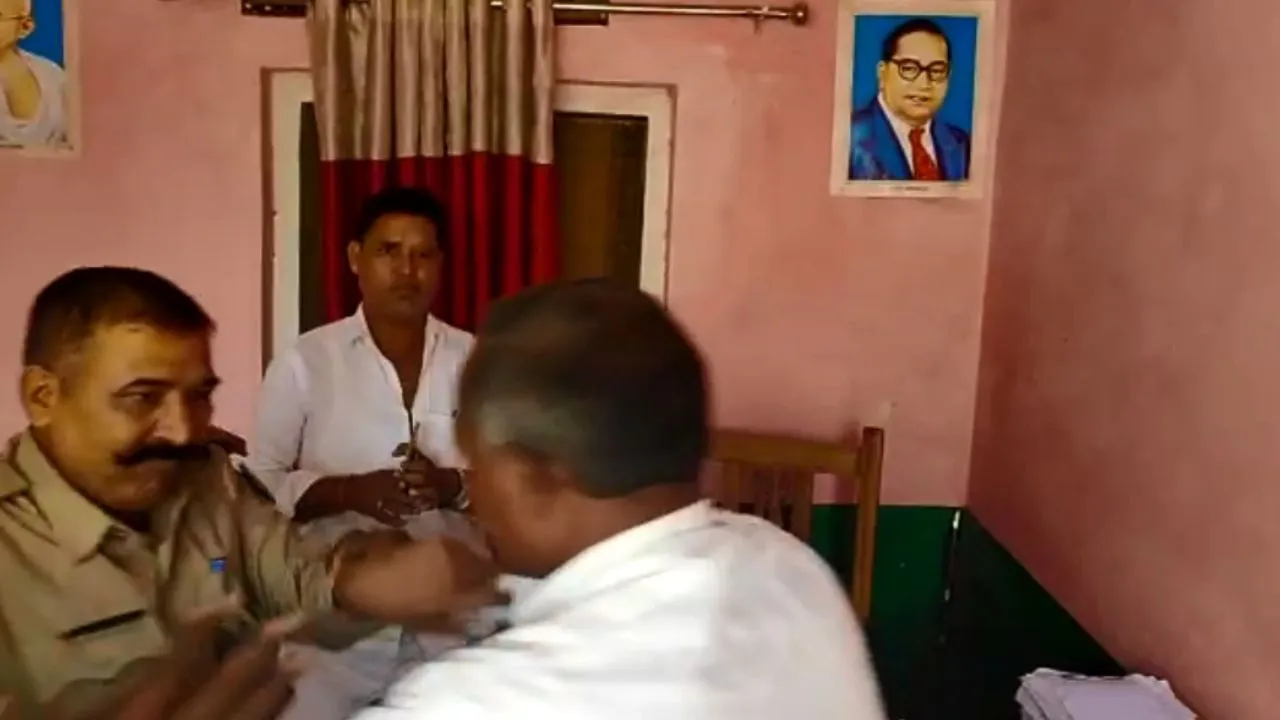 वर्दी के नशे में चूर दरोगा ने रिटायर्ड फौजी को मारा थप्पड़, VIDEO में देखें उसके बाद क्या हुआ