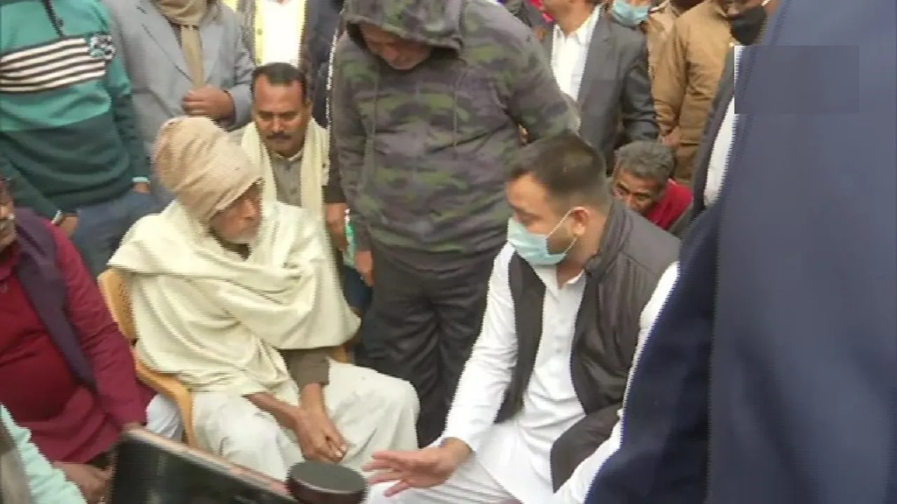 RJD leader Tejashwi Yadav meets the family of Rupesh Singh