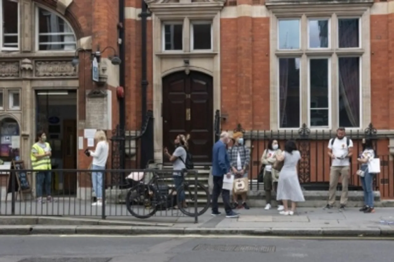 People queue