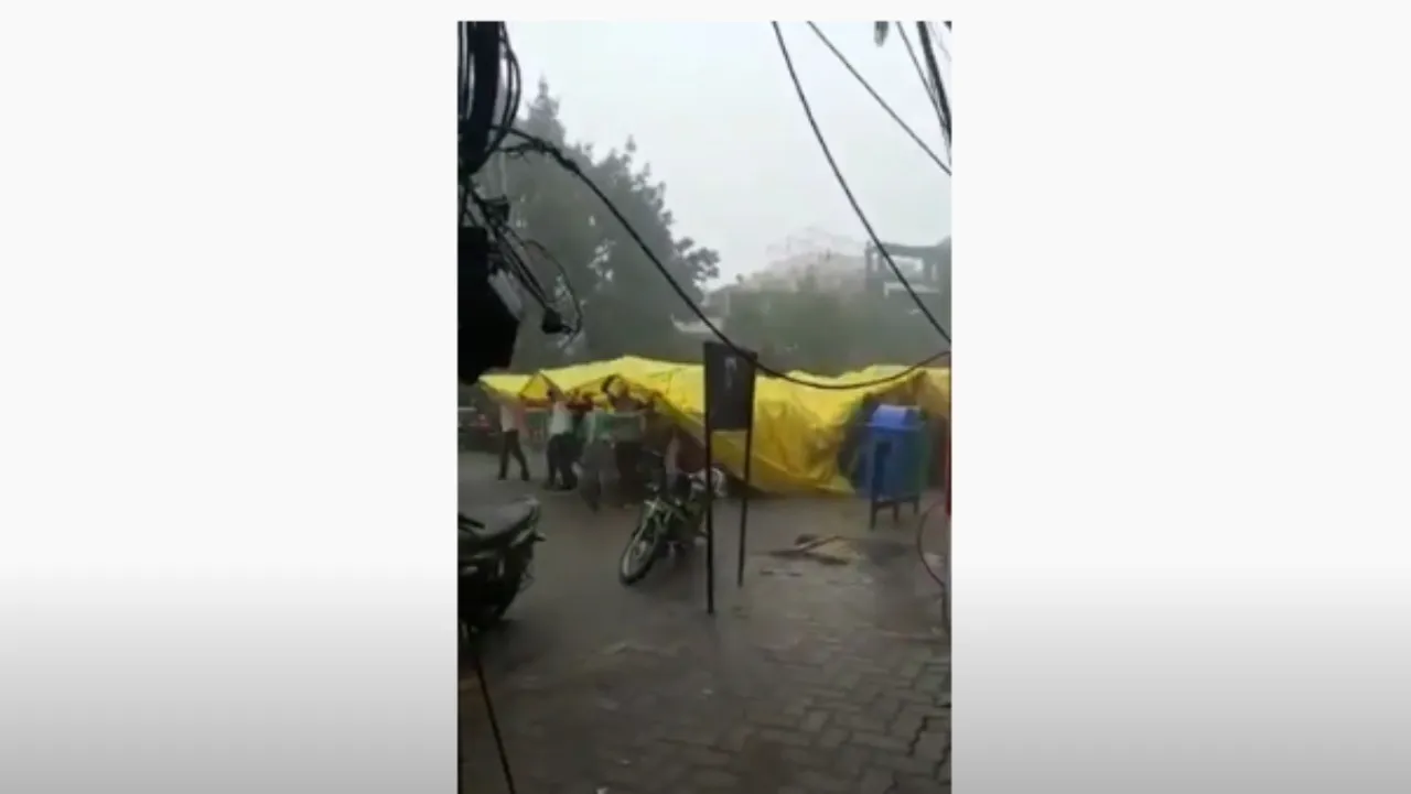 Tirpal Barat In Heavy Rain MP