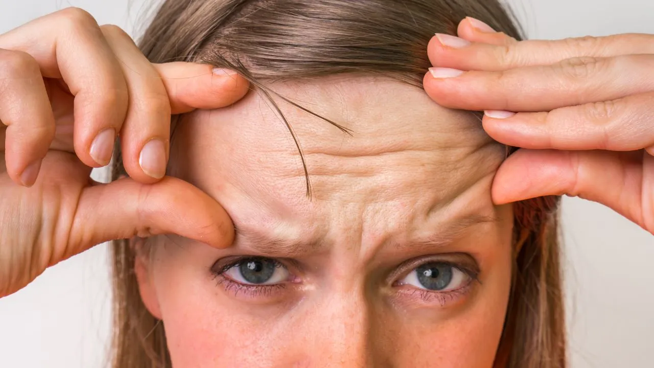 Round mark in the middle of the forehead