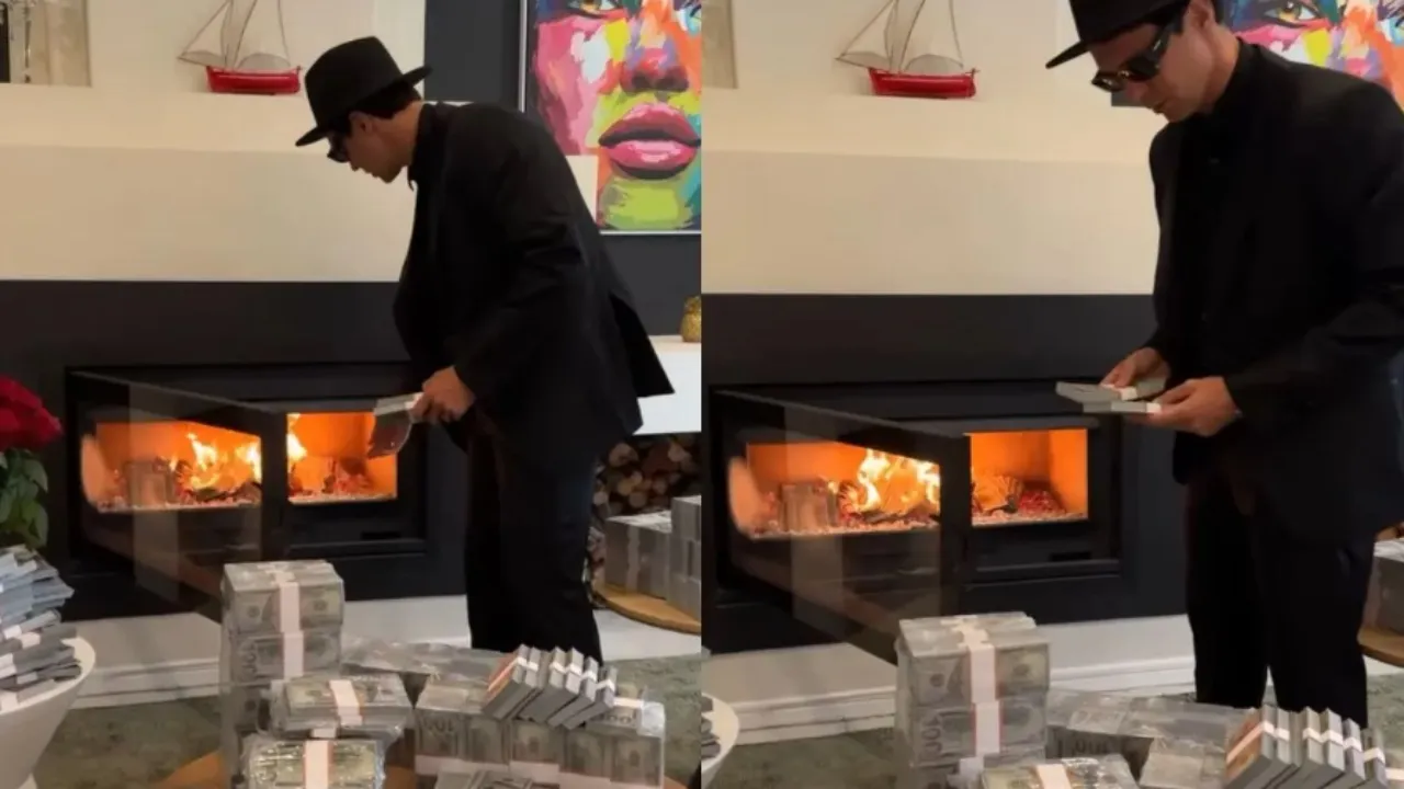 man burning notes