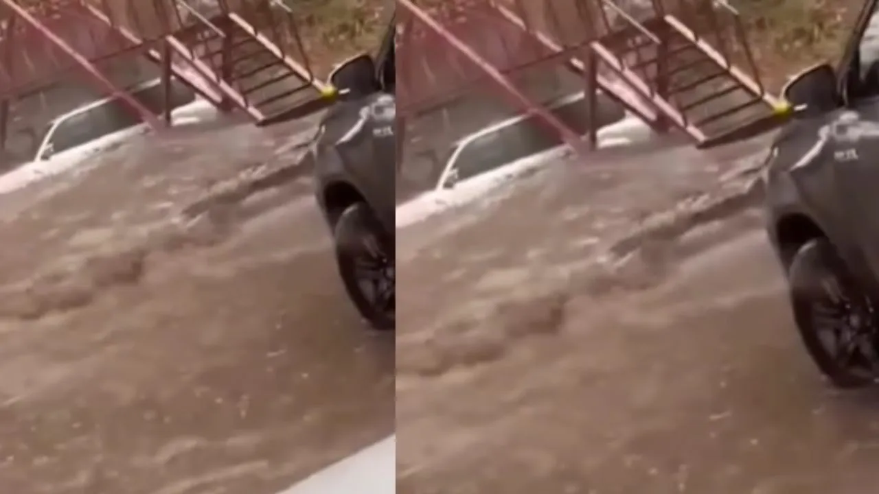 car submerged in flood water