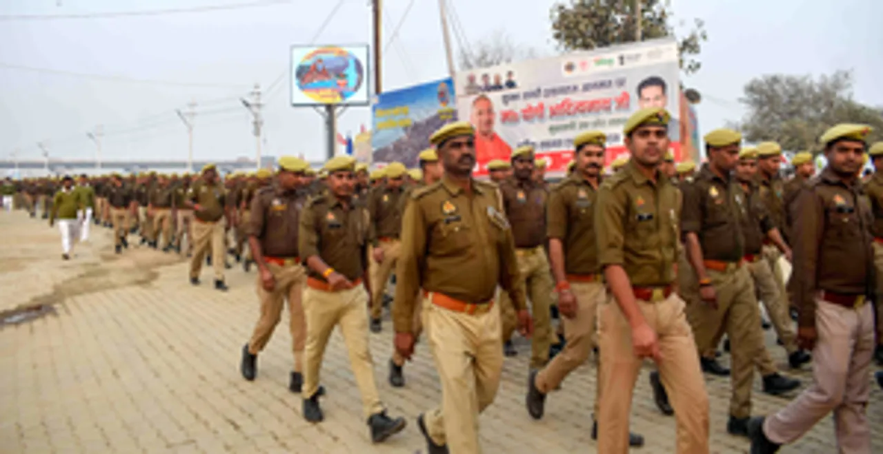 Prayagraj: Police personnel march through the Kumbh Mela area as preparations intensify ahead of the Maha Kumbh Mela 2025