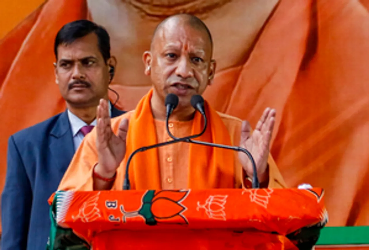 New Delhi: Uttar Pradesh Chief Minister Yogi Adityanath attends a public meeting in support of BJP Karol Bagh candidate Dushyant Gautam