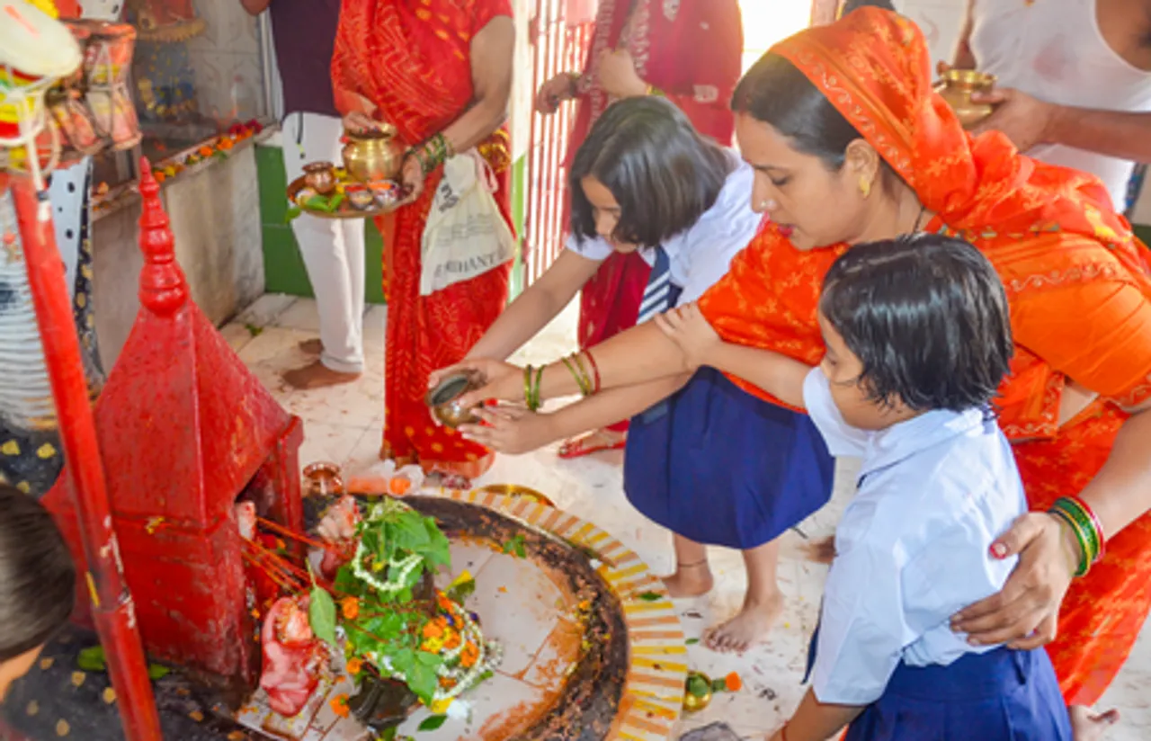 Patna: Devotees offer prayers at a temple
