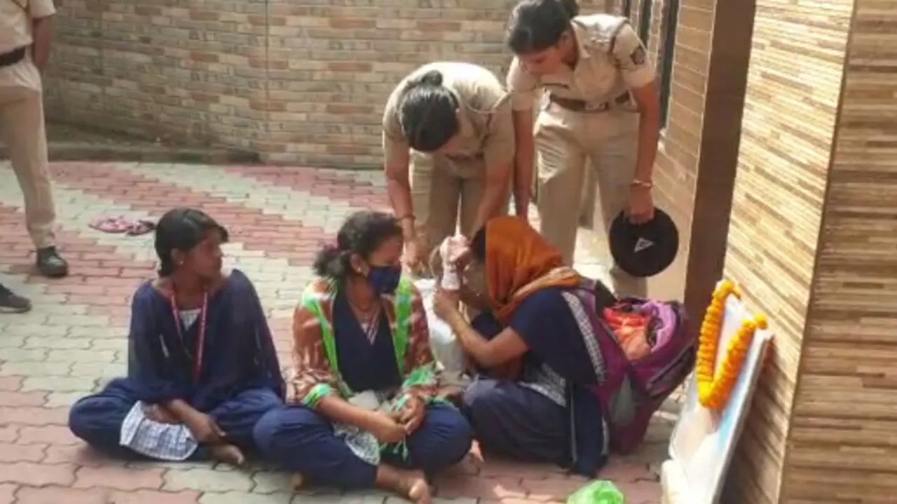 students strike in front of the District Collector's office