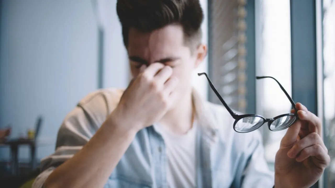 A man feeling eye problem 