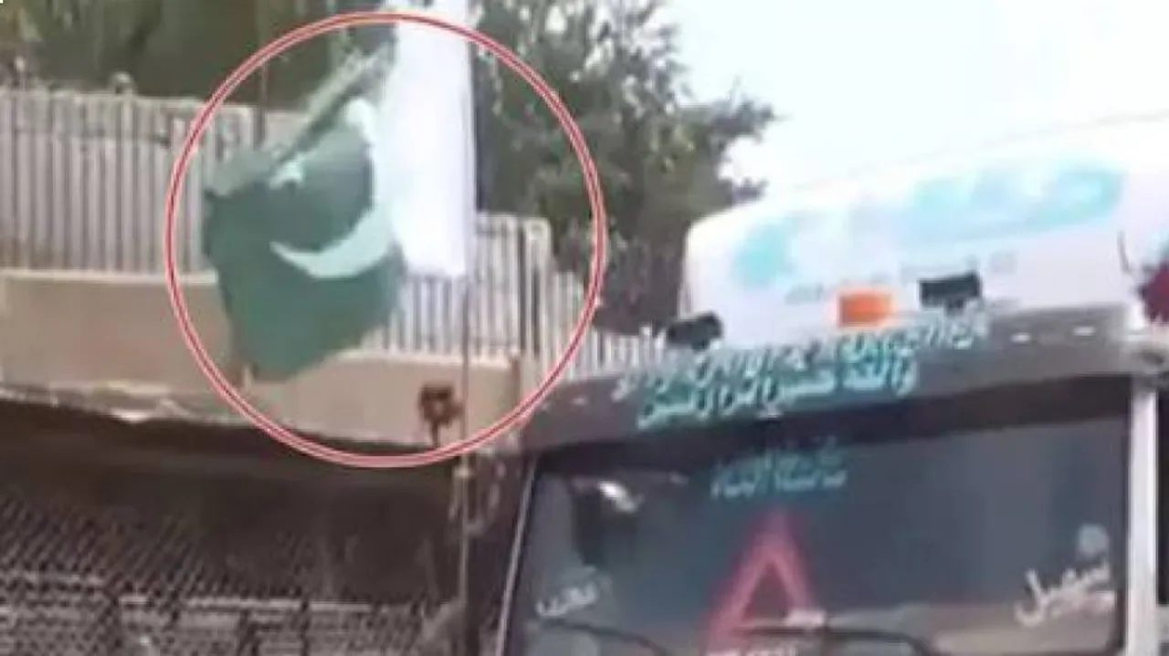 Taliban Fighter Tore Pakistan Flag