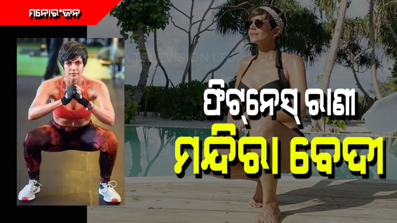 Actress Mandira Bedi doing exercise in one row thirty three handstand