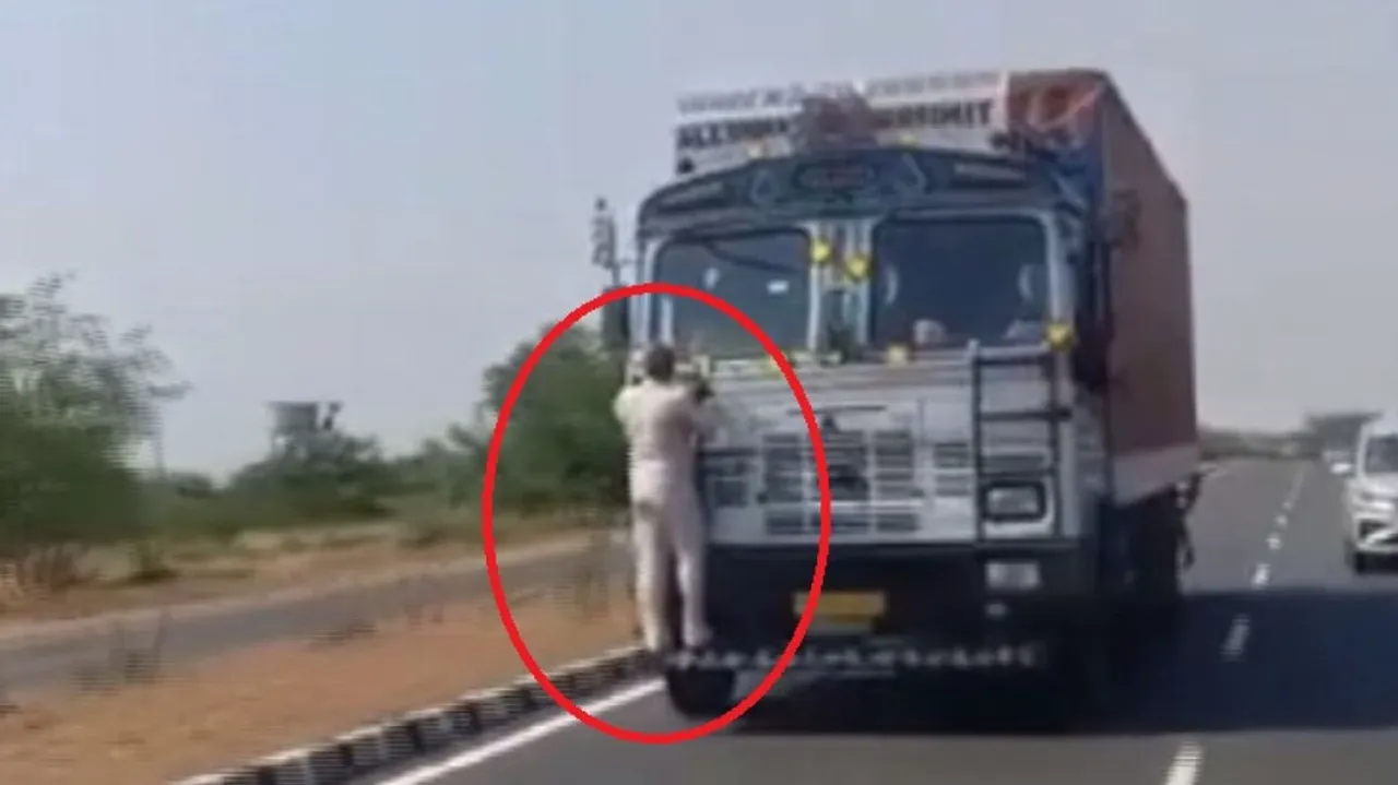 Truck drags Toll Employee  