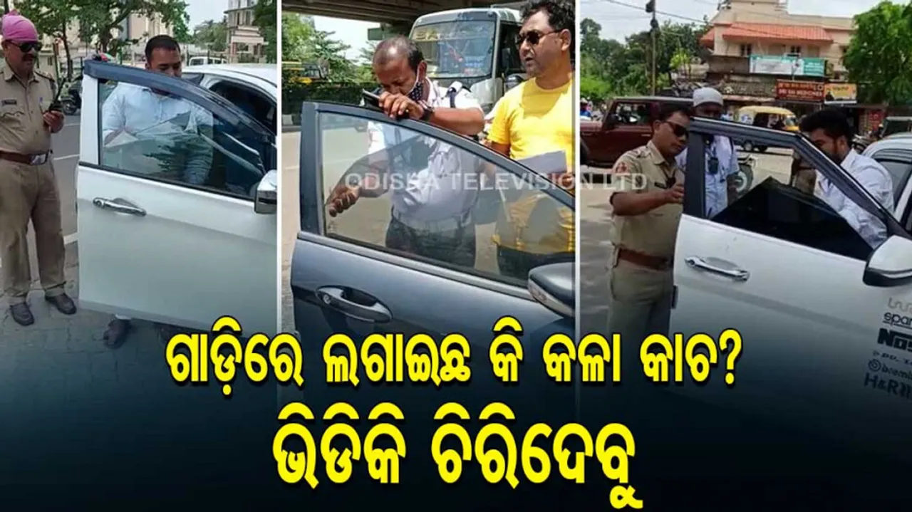 Traffic police remove illegal black screen from cars 
