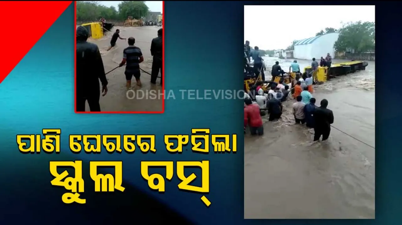 Locals rescue people after their school bus overturned as it got stuck