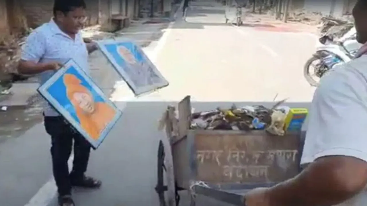 Sanitation worker sacked for carrying photos of PM Modi, Yogi Adityanath in garbage cart
