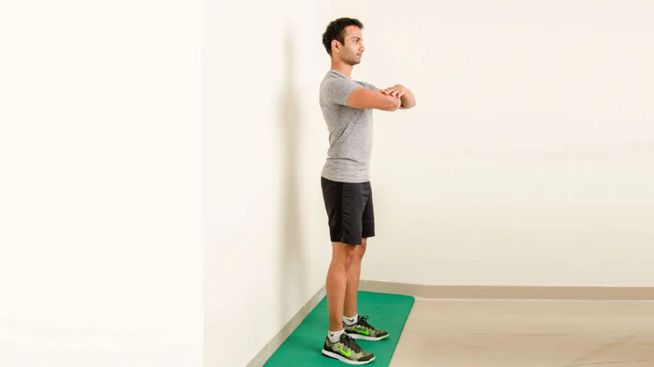 Wall squats for strong legs