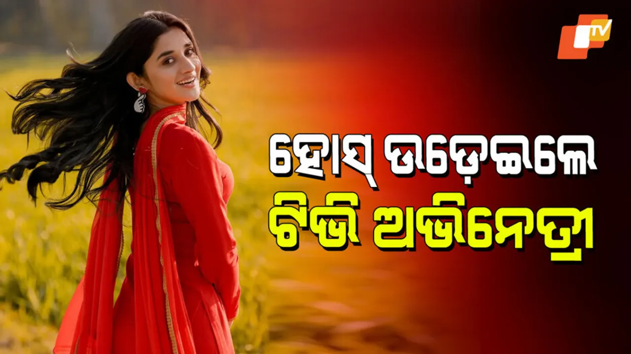 Actress kanika mann shared latest pics in red suit 