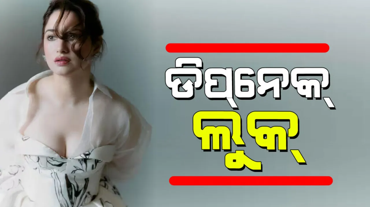 Tamannaah Bhatia shares sizzling pictures in white deepneck gown