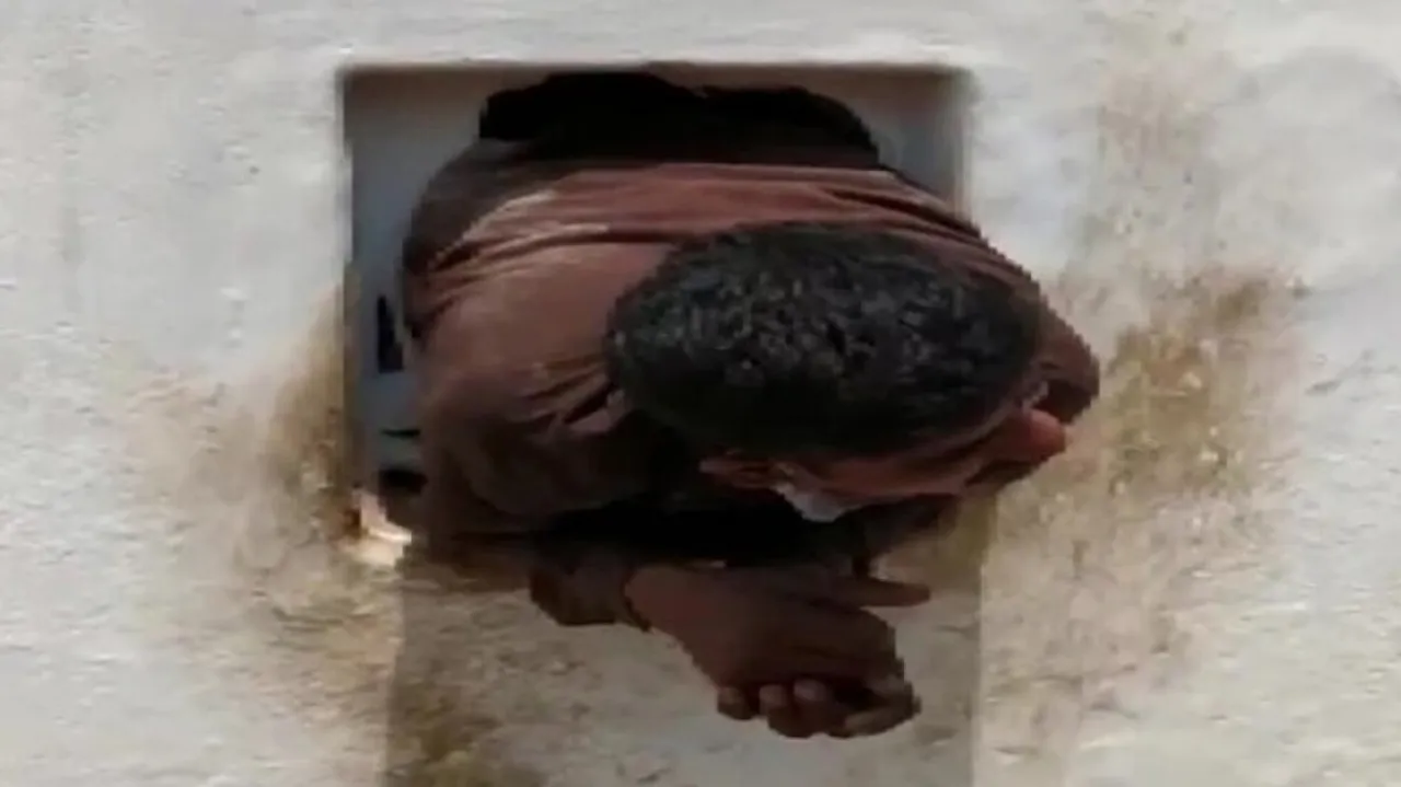 Fleeing Thief Gets Trapped In Hole
