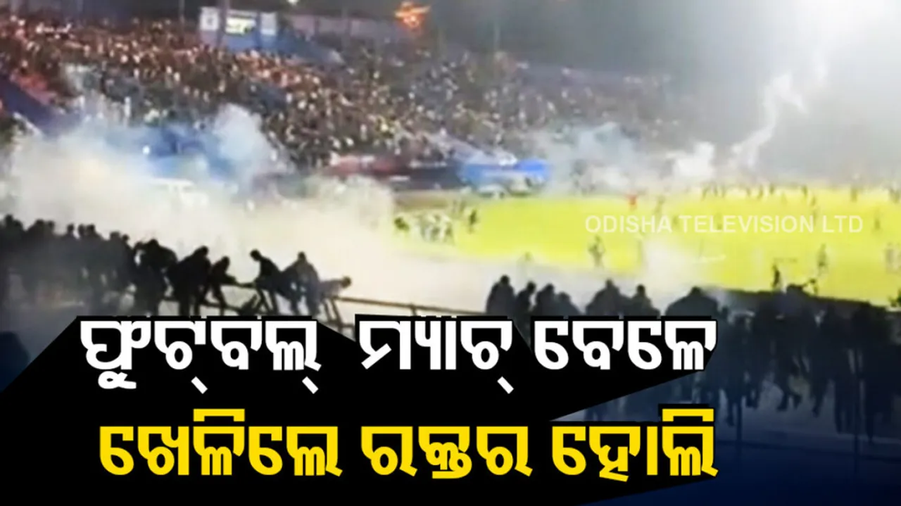 At least 127 dead after violence at football match in Indonesia