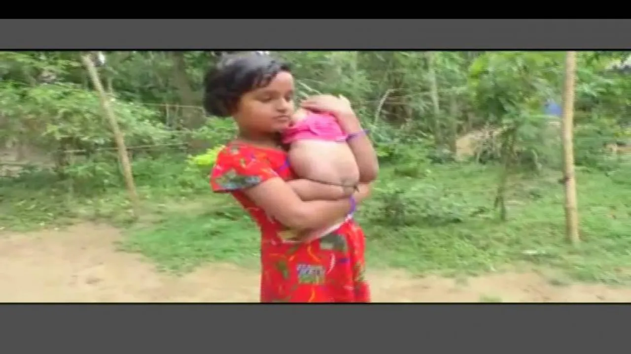 ୭ ବର୍ଷର କ୍ରୀଷ୍ଣା ମୁଣ୍ଡରୁ ଉଠିଗଲା ବାପା-ମାଙ୍କ ହାତ, ଏବେ ଦେଢ଼ ମାସର ଭାଇକୁ ଧରି କାଟୁଛି ଦିନ