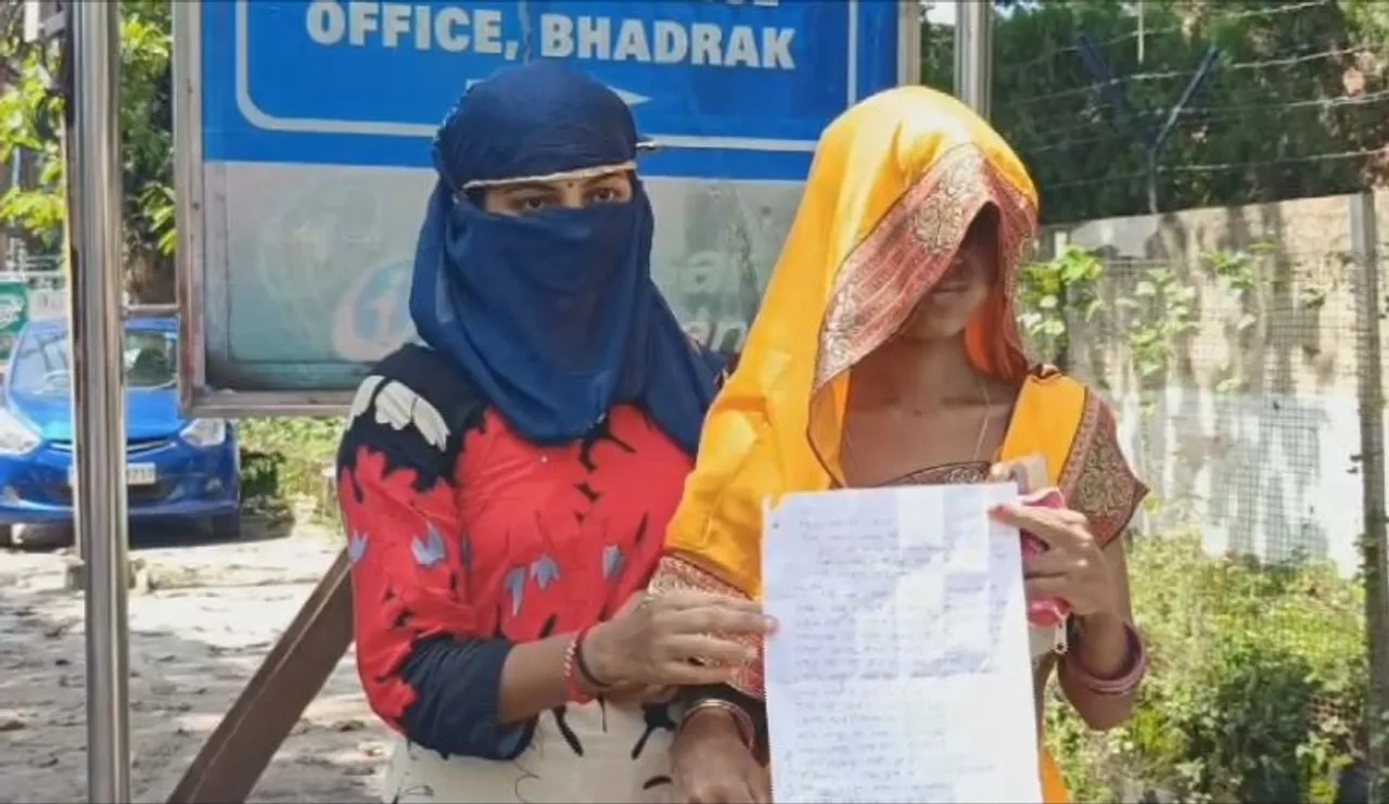 The two victim woman approach Bhadrak SP